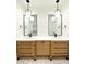Double vanity in a modern bathroom with geometric floor tiles at 1449 Jeremy Cay Ct, Awendaw, SC 29429