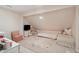 Attic bedroom featuring soft lighting, pink accents, carpet and twin beds at 1511 Fairway Dr, Charleston, SC 29412