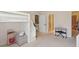 Bedroom featuring loft bed with bonus space, piano, and doorway to bathroom at 1511 Fairway Dr, Charleston, SC 29412