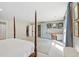 Bedroom featuring canopy bed and built-in desk space with shelves at 1511 Fairway Dr, Charleston, SC 29412