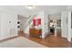 Spacious entryway with hardwood floors, staircase, and views into the living areas at 1511 Fairway Dr, Charleston, SC 29412