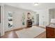 Bright foyer with hardwood floors, a front door, and a view into other rooms at 1511 Fairway Dr, Charleston, SC 29412