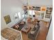 Overhead view of a spacious living room with a vaulted ceiling, built-in shelves, and stylish furnishings at 1511 Fairway Dr, Charleston, SC 29412
