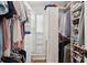 This well-organized walk-in closet features custom shelving and drawers for optimal storage and organization at 1511 Fairway Dr, Charleston, SC 29412