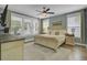 Bright bedroom with ample windows, stylish furnishings, and a comfortable queen-sized bed at 1513 Cultivation Ln, Mount Pleasant, SC 29466