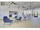 Bright common area with wood floors, ceiling fans, outdoor views and a kitchenette for community members at 1513 Cultivation Ln, Mount Pleasant, SC 29466