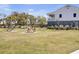 Outdoor gathering space with picnic tables and a grill, perfect for community events and relaxation at 1513 Cultivation Ln, Mount Pleasant, SC 29466