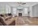Cozy living room featuring a fireplace, hardwood floors, and comfortable seating at 1513 Cultivation Ln, Mount Pleasant, SC 29466
