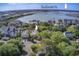 Beautiful aerial view of the neighborhood, close to the coast and nestled amongst lush trees at 1551 Ben Sawyer Blvd # 44, Mount Pleasant, SC 29464