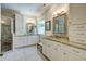 Elegant bathroom with double sinks, granite countertops, white cabinets and walk-in shower at 1551 Ben Sawyer Blvd # 44, Mount Pleasant, SC 29464