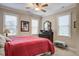 Comfortable bedroom with ceiling fan, carpeted floors, and great natural light at 1551 Ben Sawyer Blvd # 44, Mount Pleasant, SC 29464