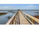 Picturesque dock leading to a charming gazebo, offering a tranquil waterfront retreat at 1551 Ben Sawyer Blvd # 44, Mount Pleasant, SC 29464