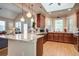Bright eat-in kitchen with hardwood flooring, granite countertops and stainless steel appliances at 1551 Ben Sawyer Blvd # 44, Mount Pleasant, SC 29464