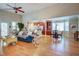 Open-concept living area with hardwood floors, high ceilings, and seamless flow to the kitchen at 1551 Ben Sawyer Blvd # 44, Mount Pleasant, SC 29464