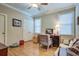 Bright office with a large window, hardwood floors, a desk, and a comfortable chair at 1551 Ben Sawyer Blvd # 44, Mount Pleasant, SC 29464