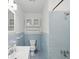 Bathroom featuring blue tile, vintage fixtures, and vanity at 1915 Aichele Dr, North Charleston, SC 29406
