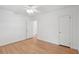 Bedroom featuring hardwood floors, white walls, and a ceiling fan at 1915 Aichele Dr, North Charleston, SC 29406