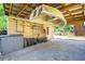 Carport featuring a boat and storage, offering covered parking and extra storage solutions at 1915 Aichele Dr, North Charleston, SC 29406