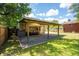 Carport exterior with a boat and storage, offering covered parking and additional storage space at 1915 Aichele Dr, North Charleston, SC 29406