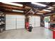 Garage with two door entrances, overhead lighting, and an open layout, ideal for storage or workshop space at 1915 Aichele Dr, North Charleston, SC 29406