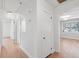 Hallway with hardwood floors leading to bedrooms and a bathroom at 1915 Aichele Dr, North Charleston, SC 29406