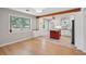 Bright kitchen features white cabinets, stainless steel appliances, an island with butcher block top, and a decorative wood beam at 1915 Aichele Dr, North Charleston, SC 29406