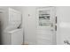 Laundry room with a stacked washer and dryer set at 1915 Aichele Dr, North Charleston, SC 29406