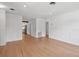 Open-concept living room with hardwood floors and lots of natural light at 1915 Aichele Dr, North Charleston, SC 29406