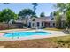 Backyard with a kidney-shaped pool, lush lawn, and ample space for relaxation and entertainment at 1918 Armory Dr, Mount Pleasant, SC 29466