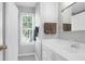 Bathroom featuring a window bringing in natural light and a white vanity with modern fixtures at 1918 Armory Dr, Mount Pleasant, SC 29466