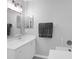 Bright bathroom featuring a white vanity, modern fixtures, and a well-lit mirror at 1918 Armory Dr, Mount Pleasant, SC 29466