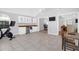 Large bonus room with vaulted ceilings, tile flooring, wet bar and entertainment area at 1918 Armory Dr, Mount Pleasant, SC 29466