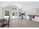 Spacious bonus room with vaulted ceilings, tile flooring, wet bar, and ample natural light at 1918 Armory Dr, Mount Pleasant, SC 29466