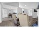 Open floorplan with dining area and views into living room with fireplace and kitchen at 1918 Armory Dr, Mount Pleasant, SC 29466