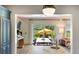Bright dining area adjacent to the kitchen with sliding glass doors to the backyard at 2 Pierates Cruz, Mount Pleasant, SC 29464