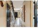 Elegant foyer with black staircase, decorative art and patterned tile flooring at 2 Pierates Cruz, Mount Pleasant, SC 29464