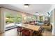 Open living and dining area, perfect for entertaining, with access to patio at 2 Pierates Cruz, Mount Pleasant, SC 29464