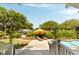 Backyard pool and patio area with lounge chairs and lush landscaping at 2 Pierates Cruz, Mount Pleasant, SC 29464