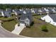 Aerial view showcasing the home's well-manicured lawn and charming curb appeal within a Gathering-friendly neighborhood at 2113 Pimlico Dr, Ridgeville, SC 29472