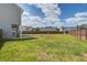 Expansive backyard complete with a patio area and lush lawn for outdoor enjoyment at 2113 Pimlico Dr, Ridgeville, SC 29472