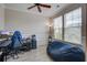 Cozy room features a comfortable beanbag chair, a desk, and natural light through large windows at 2113 Pimlico Dr, Ridgeville, SC 29472
