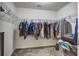 Walk-in closet with ample hanging space, wire shelving, and a carpeted floor at 2113 Pimlico Dr, Ridgeville, SC 29472
