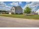 Charming two-story home with manicured lawn, tasteful landscaping, and a cozy curb appeal at 2113 Pimlico Dr, Ridgeville, SC 29472