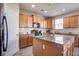 Kitchen with a granite island, ample cabinet space, stainless steel appliances, and white tile backsplash at 2113 Pimlico Dr, Ridgeville, SC 29472