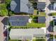 Overhead view of a charming home with solar panels and green landscaping in a suburban neighborhood at 218 Barberry St, Summerville, SC 29483