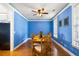 Bright dining room with hardwood floors, ceiling fan, and natural light at 218 Barberry St, Summerville, SC 29483