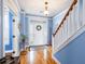 Inviting foyer with a staircase, hardwood floors, and a bright, welcoming entrance at 218 Barberry St, Summerville, SC 29483
