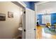 Hallway view leading to a half bath and a living room with a fireplace at 218 Barberry St, Summerville, SC 29483