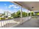 Spacious porch with views of the neighborhood homes and lush landscaping at 218 Barberry St, Summerville, SC 29483