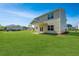 Spacious backyard featuring a manicured lawn, a patio, and an outdoor gazebo at 222 Torslanda Ln, Summerville, SC 29486